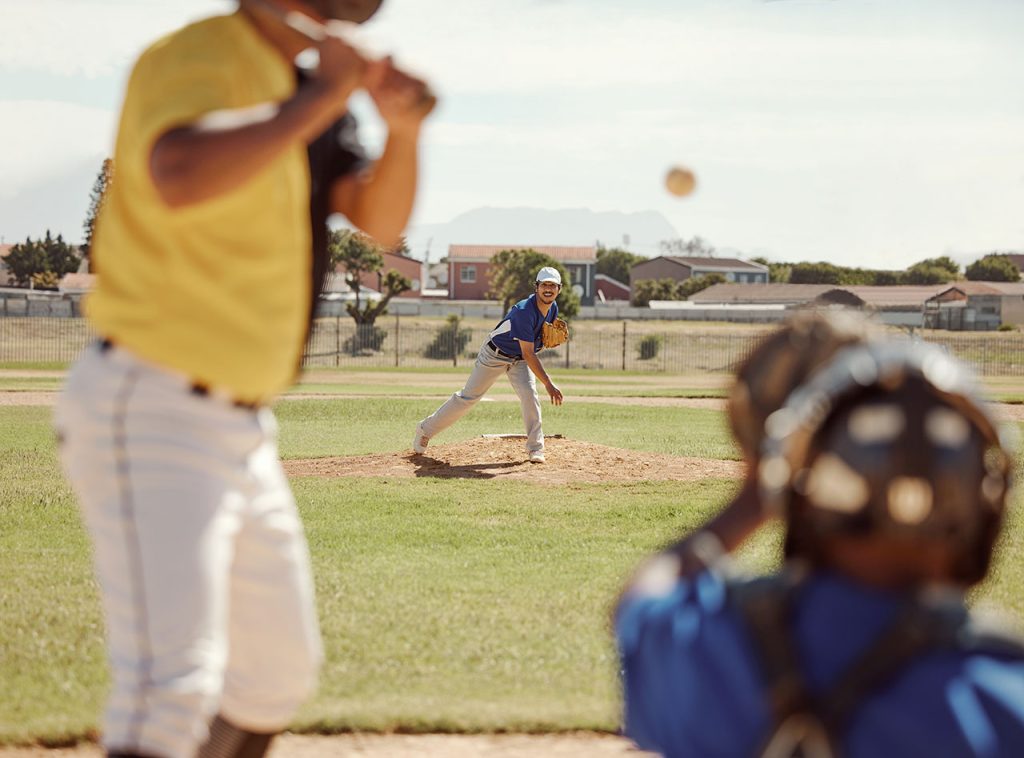 Baseball, bat and man ready for a fast ball on a baseball field in a training match or game outdoor.